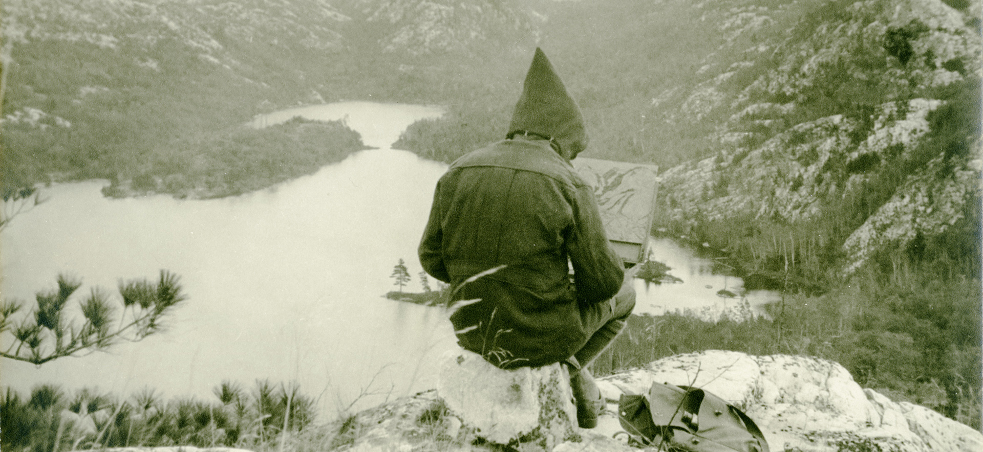 Franklin Carmichael sketching at Grace Lake, 1935, Photograph by Joachim Gauthier, McMichael Canadian Art Collection Archives